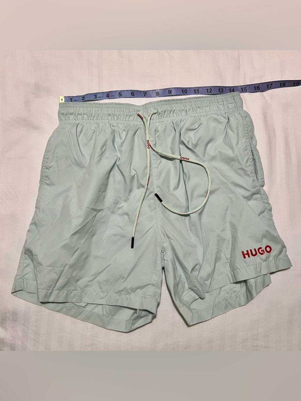 HUGO Light Mint Green Swim Shorts with Red Logo